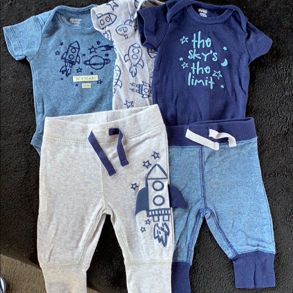 Bundle of newborn space themed onesies and pants